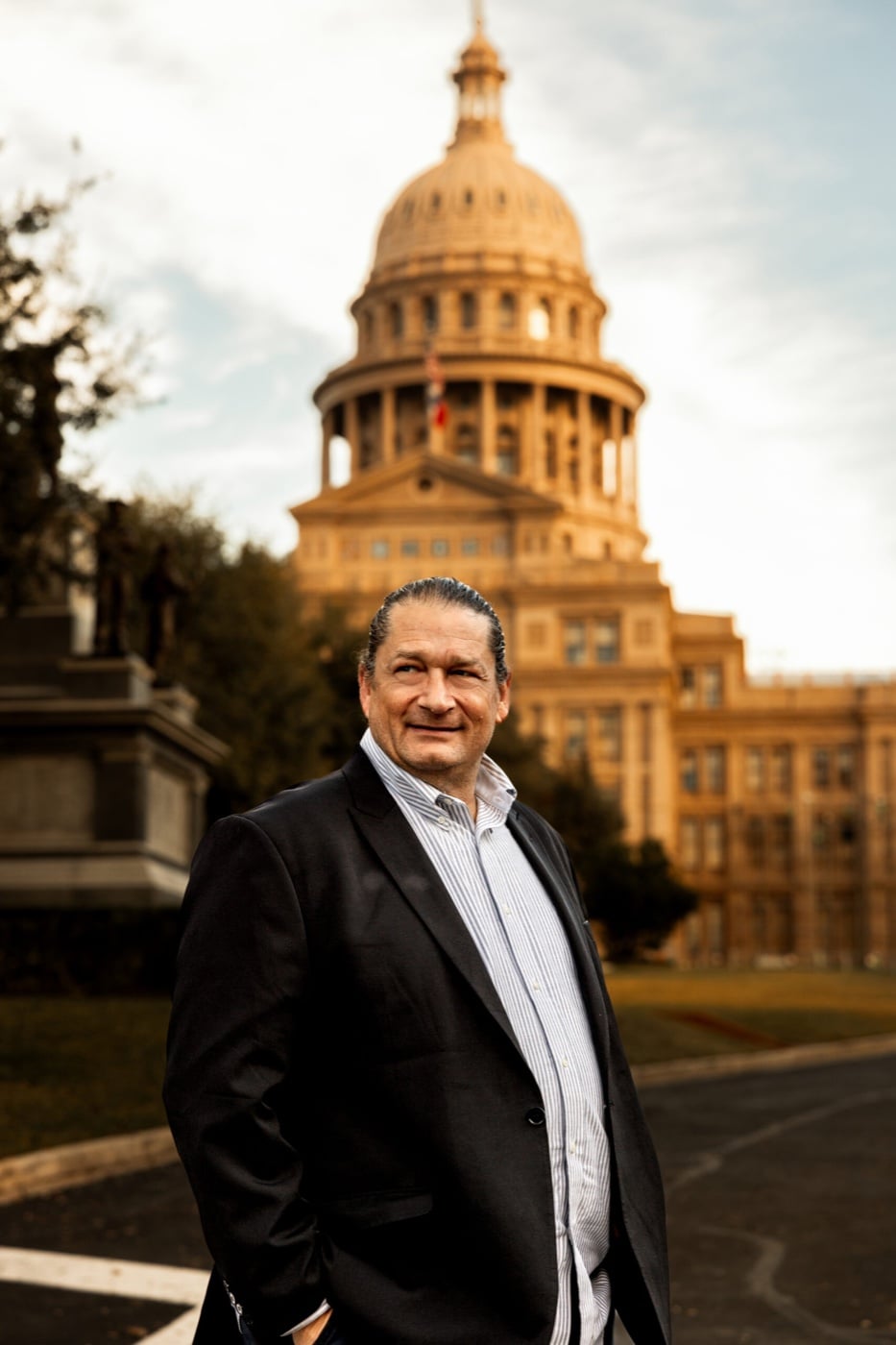 Will Helixon in front of the Texas State Capitol